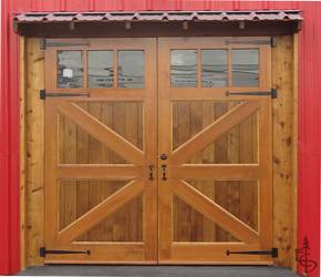 Evergreen's Britannia braced carriage doors with glass created a picturesque entry for the showroom of a classic car dealership.