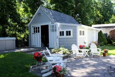 Carriage doors transform a detached garage into a three-season party room.