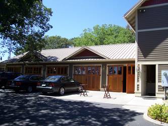 Historic bed and breakfast house with carriage doors enclosing a catering kitchen